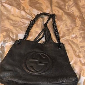 Gray Gucci bag